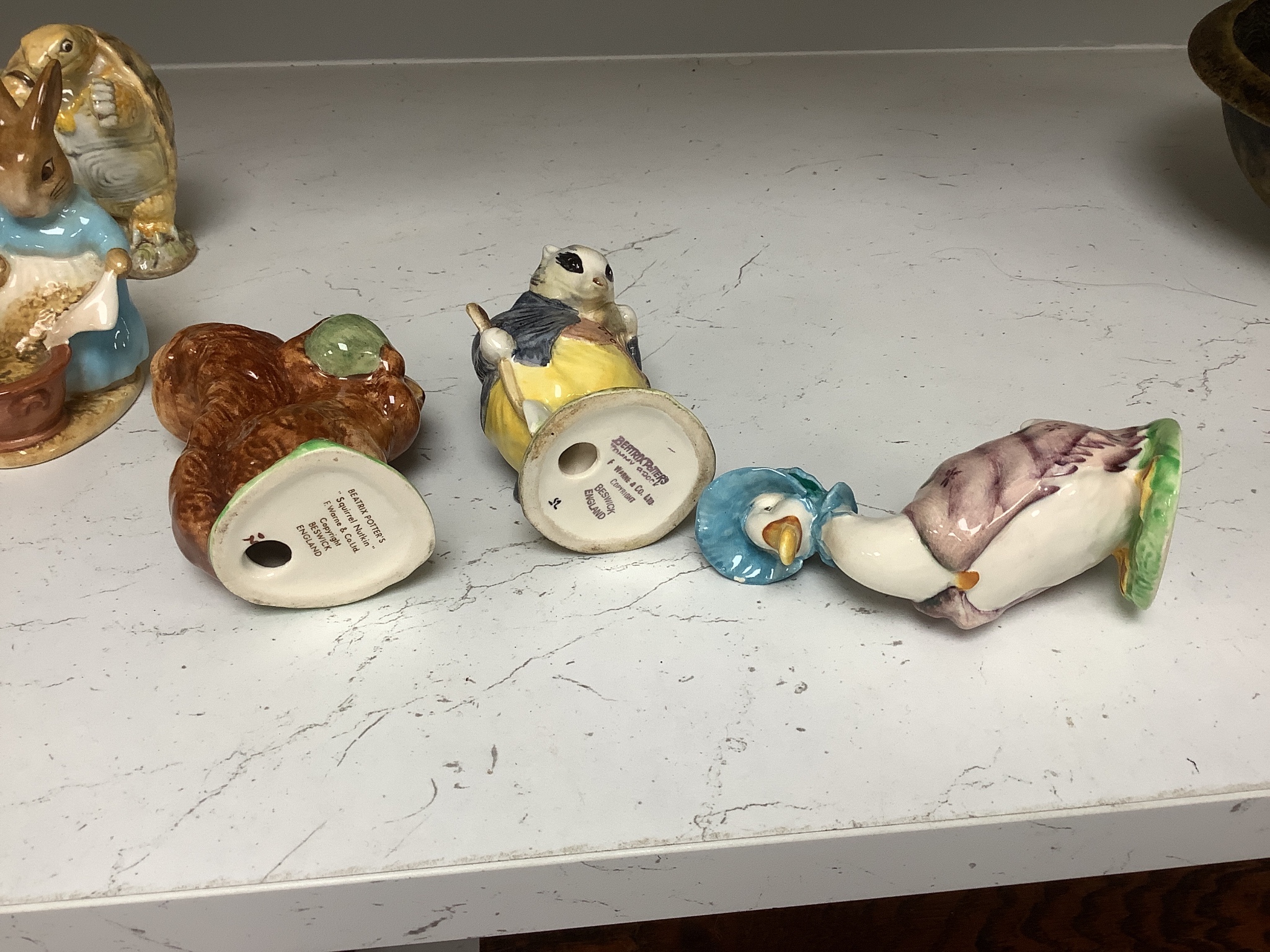 Sixteen Beswick “Beatrix Potter” character figures